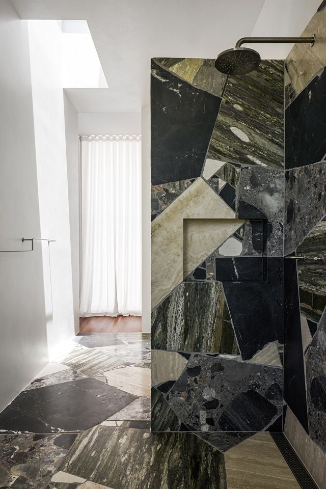 Slabs of Rocca Bianca, Verde Bardini, Black Fantasy and Canova to floors and walls.jpg