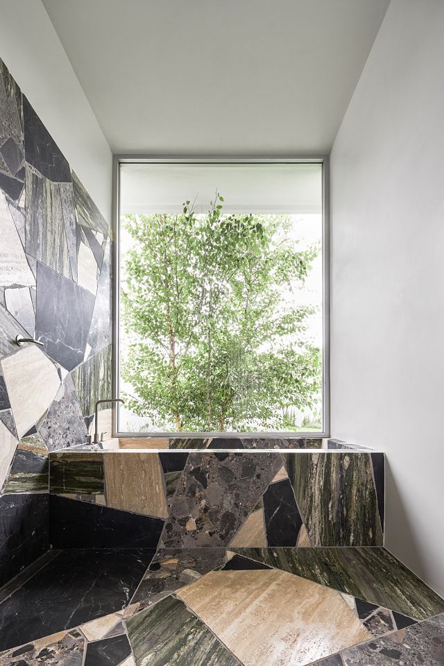 Slabs of Rocca Bianca, Verde Bardini, Black Fantasy and Canova to floors, walls and bath.jpg