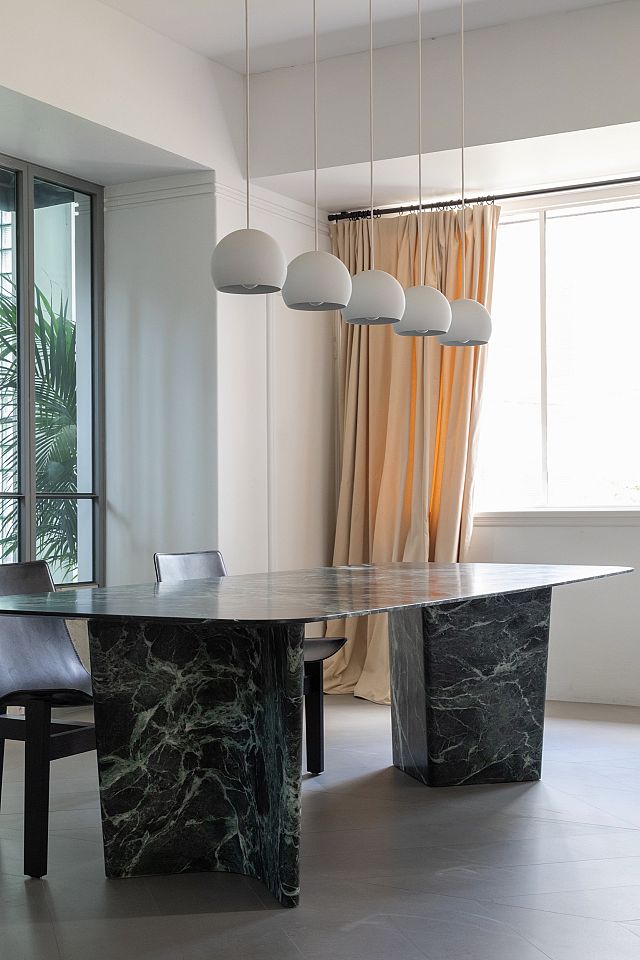 Custom New Volumes Wyrie table in Predia marble.jpg