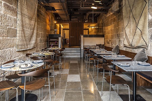 Buxeuil Honed and Buxeuil Flamed to floors. Buxeuil Chiselled to verticals:stairs. Tayim restaurant designed by Welsh and Major - 02.jpg