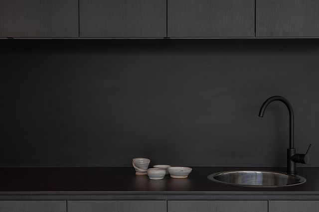 Artetech Carbone porcelain panels on the benchtop and splashback at Hurstville Grove by Studio Priscilla