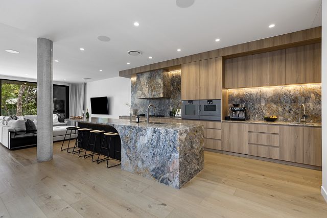 Kalana kitchen island, benchtop, splashback and rangehood at Ramon by Saba Projects. Photography by EOS.jpg