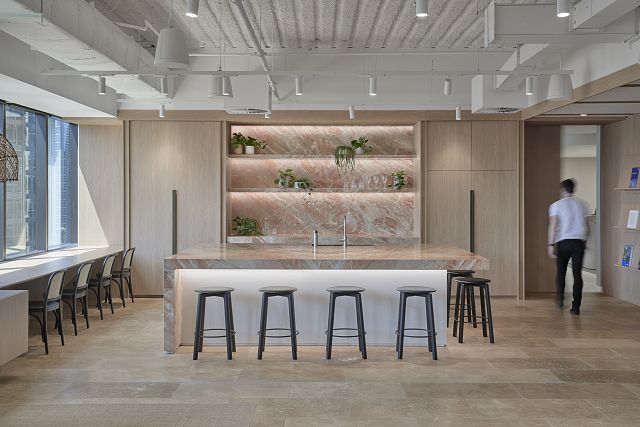 Damasca kitchen surfaces and Travertine Noce crosscut tiled floor at BlueScope by Bates Smart. Photography by Peter Bennetts..jpg