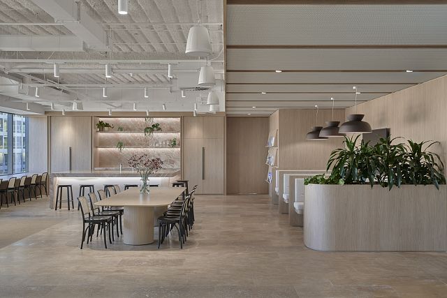 Damasca kitchen surfaces and Travertine Noce crosscut tiled floor at BlueScope by Bates Smart. Photography by Peter Bennetts..jpg